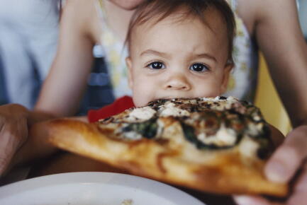 Mother-and-Baby-Eating-Pizza-Photos_GettyimagesCharles-Gullung