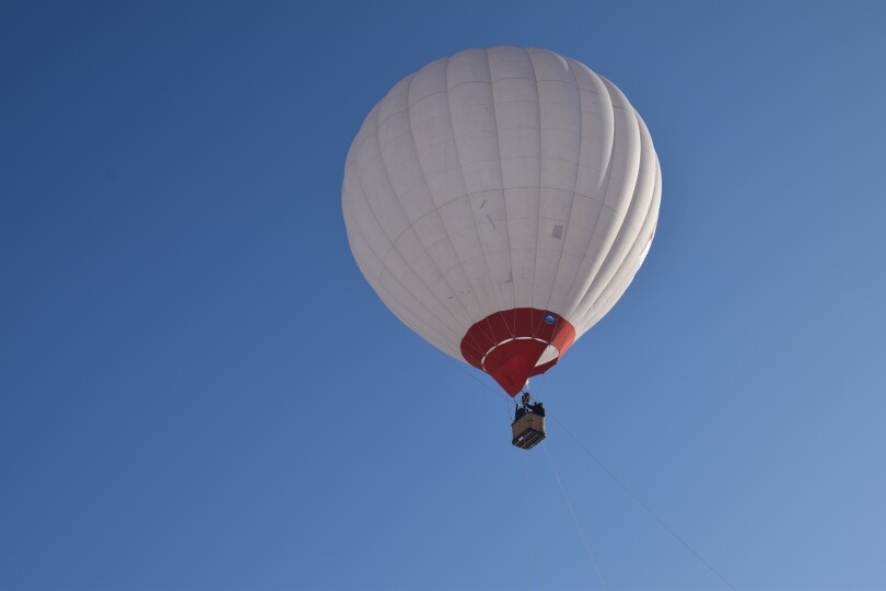 ow-Angle-View-Of-Hot-Air-Balloon-Against-Clear-Sky-_GettyimagesSof-Zalubovska-EyeEm