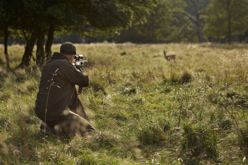 Male-hunter-aiming-at-deer-with-rifle_Gettyimages-Klaus-Vedfelt