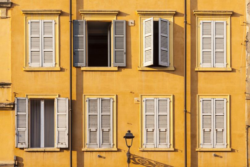 Colorful-house-facades-in-Piazza-XX-Settembre_GettyimagesJulian-Elliott-Photography