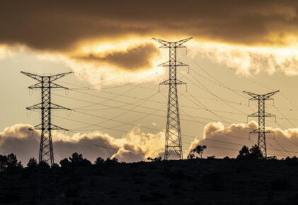 Electric-towers-next-to-a-high-voltage-electric-station_GettyimagesJose-A.-Bernat-Bacete