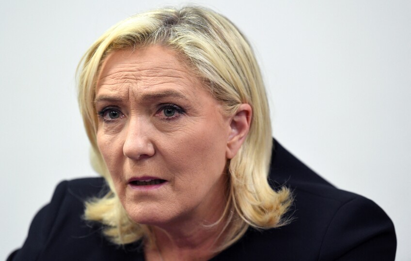 France's far-right party Rassemblement National (RN) candidate for the 2022 French presidential election Marine Le Pen looks on as she gives a press conference on February 1, 2022 in Brest, western France. (Photo by Fred TANNEAU / AFP)