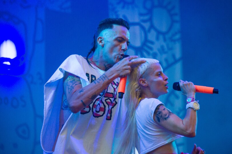 South African band Die Antwoord performs on stage during the 27th Eurockeennes music festival on July 5, 2015 in Belfort. AFP PHOTO / SEBASTIEN BOZON (Photo by SEBASTIEN BOZON / AFP)