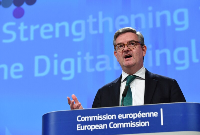 European Union Commissioner for Security Union Julian King addresses a press conference on the Commission initiatives to tackle the spread of disinformation online and to increase transparency and fairness between platforms and businesses, at the European Commission in Brussels on April 26, 2018. (Photo by Emmanuel DUNAND / AFP)