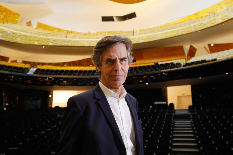Laurent Bayle, president of the Philharmonie de Paris, poses on the stage of the Symphonic Hall 'Grande salle Pierre Boulez', on May 6, 2020, in Paris, during a lock-out in France aimed at stopping the spread of the COVID-19 pandemic, caused by the novel coronavirus. (Photo by FRANCOIS GUILLOT / AFP)