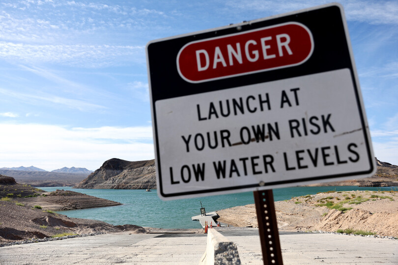 LAKE MEAD NATIONAL RECREATION AREA, NEVADA - MAY 10: A danger sign is posted near a faltering boat launch ramp which is set to be relocated due to lowering water levels on drought-stricken Lake Mead on May 10, 2022 in the Lake Mead National Recreation Area, Nevada. The U.S. Bureau of Reclamation reported that Lake Mead, North America's largest artificial reservoir, has dropped to about 1,052 feet above sea level, the lowest it's been since being filled in 1937 after the construction of the Hoover Dam. Two sets of human remains have been discovered recently as the lake continues to recede. The declining water levels are a result of a climate change-fueled megadrought coupled with increased water demands in the Southwestern United States. Mario Tama/Getty Images/AFP (Photo by MARIO TAMA / GETTY IMAGES NORTH AMERICA / Getty Images via AFP)