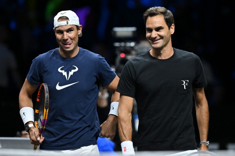 Switzerland's Roger Federer (R) and Spain's Rafael Nadal attend a practice session ahead of the 2022 Laver Cup at the O2 Arena in London on September 22, 2022. (Photo by Glyn KIRK / AFP) / RESTRICTED TO EDITORIAL USE