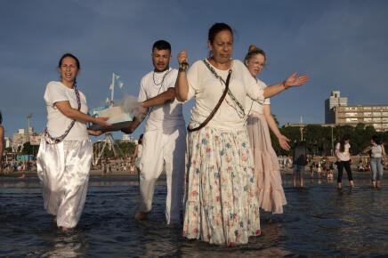 People give offerings to Iemanja, the Goddess of the Sea of the Afro-American religion Umbanda