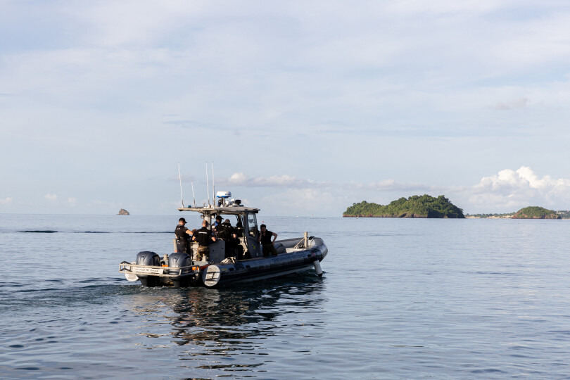 French gendarmes of the nautical brigade operate on the Mukombe boat, preparing for an operation against illegal migration in French territorial seas on the island of Mayotte, on April 24, 2023. - Authorities in Mayotte were expected to launch Operation Wuambushu ("Take Back") as early as this weekend to remove illegal migrants who have settled in slums on the island, with more than 2,000 police and administrative officials mobilised to set in train the expulsions of those illegally on the island and tear down the makeshift squats housing them. (Photo by Morgan Fache / AFP)